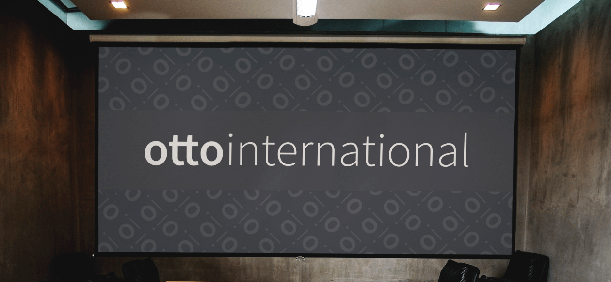 Portraying the Otto International logo on a projector screen